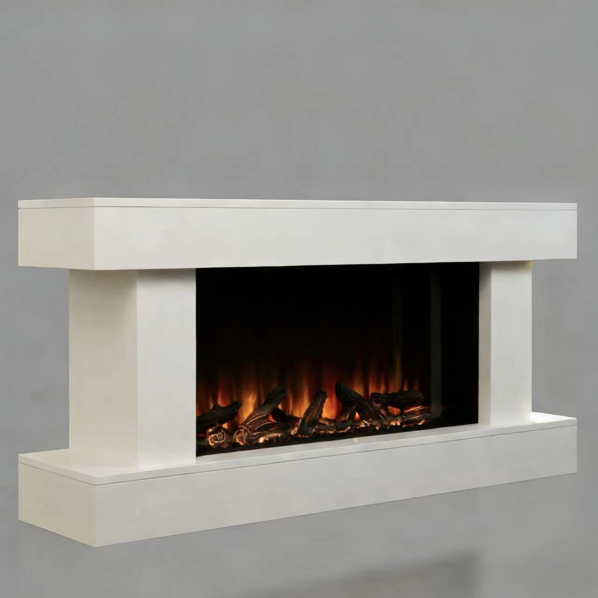 A modern white electric fireplace with a floating mantel and base, featuring a black firebox with glowing orange and yellow flames and dark logs, set against a solid gray background.