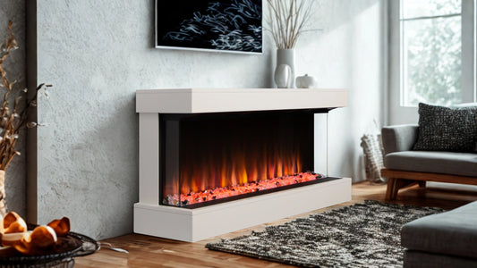 Modern living room with a white electric fireplace, art frame, and decor.