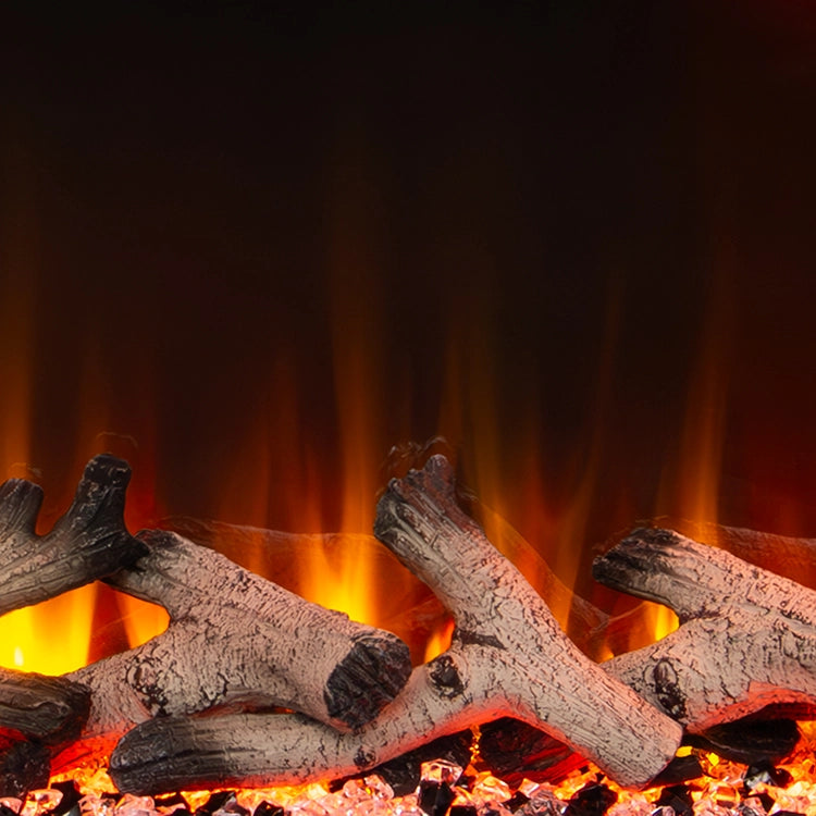 Close-up of burning wood logs with flames in a fireplace