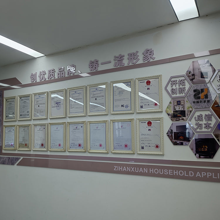 Certification wall at Zihan Fireplace factory, displaying CSA, CE, UL, and FCC approvals for electric fireplaces.