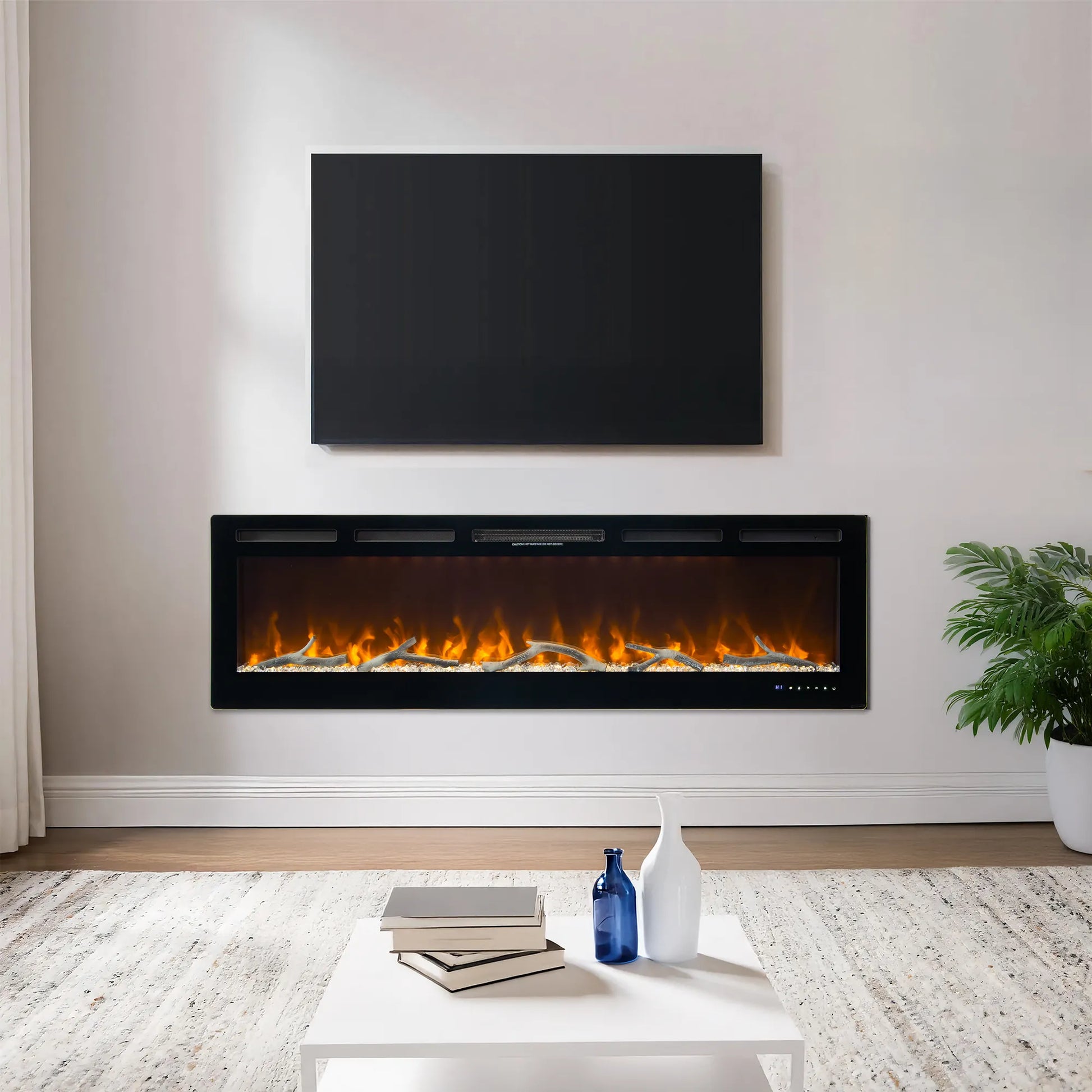 Modern living room with electric fireplace, TV, and decor items.