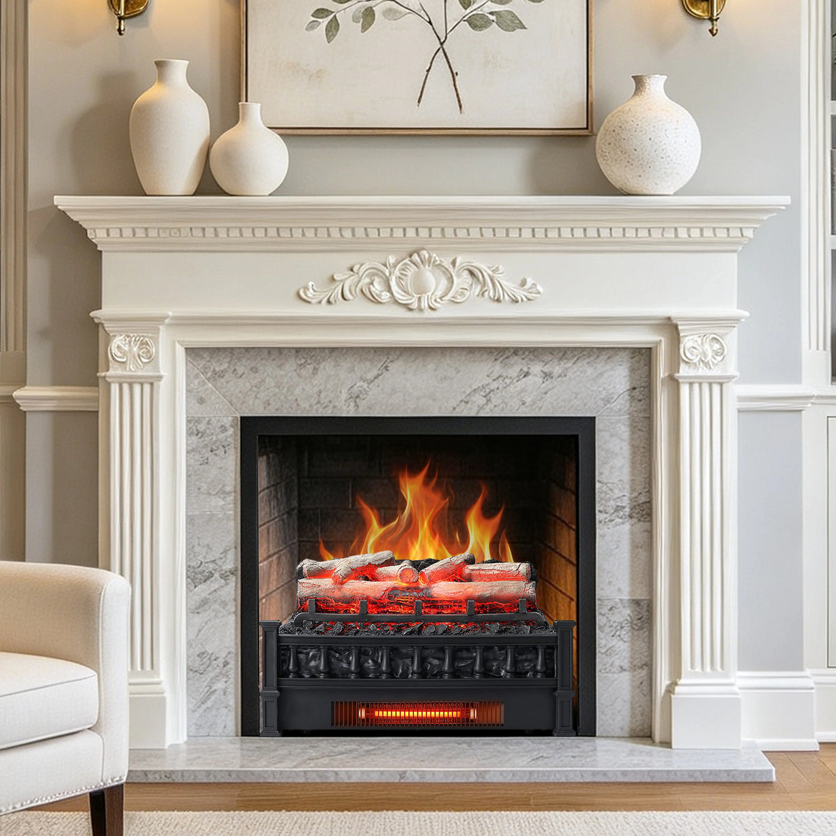 An electric fireplace insert with glowing logs, set within a white carved mantel and a gray marble surround, in a styled living room setting.