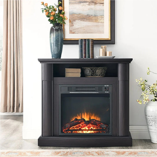 Black electric fireplace with flames on a wooden stand in a room with decor elements.