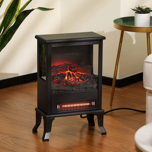 Black electric stove with flame effect on a wooden floor, surrounded by decor elements.