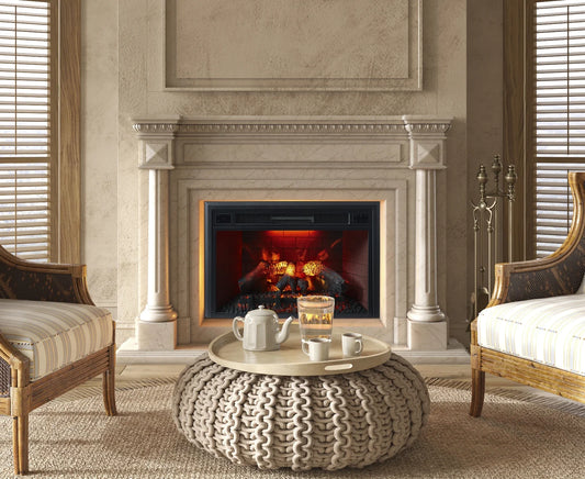 Living room with a fireplace, chairs, and a coffee table.