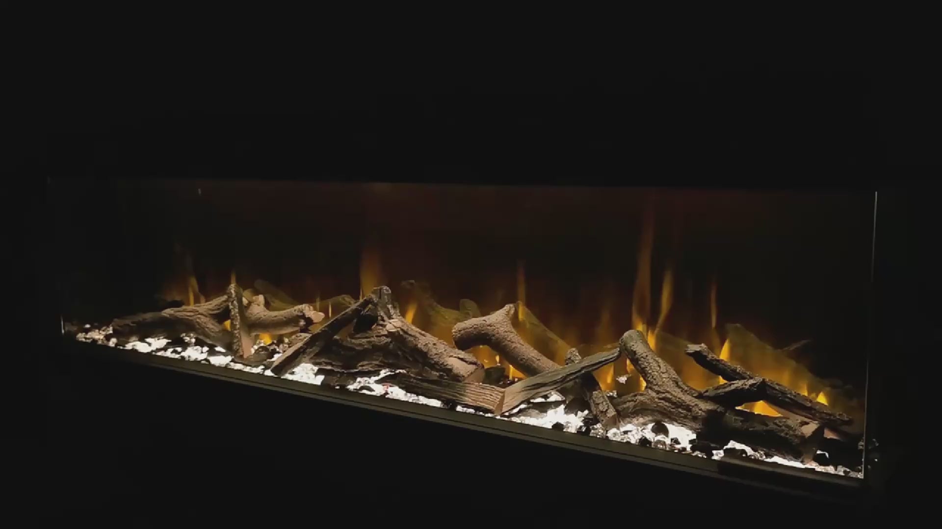 Charger la vidéo : Realistic flame effect of a 3-sided electric fireplace, showcasing vibrant LED colors and lifelike fire visuals.